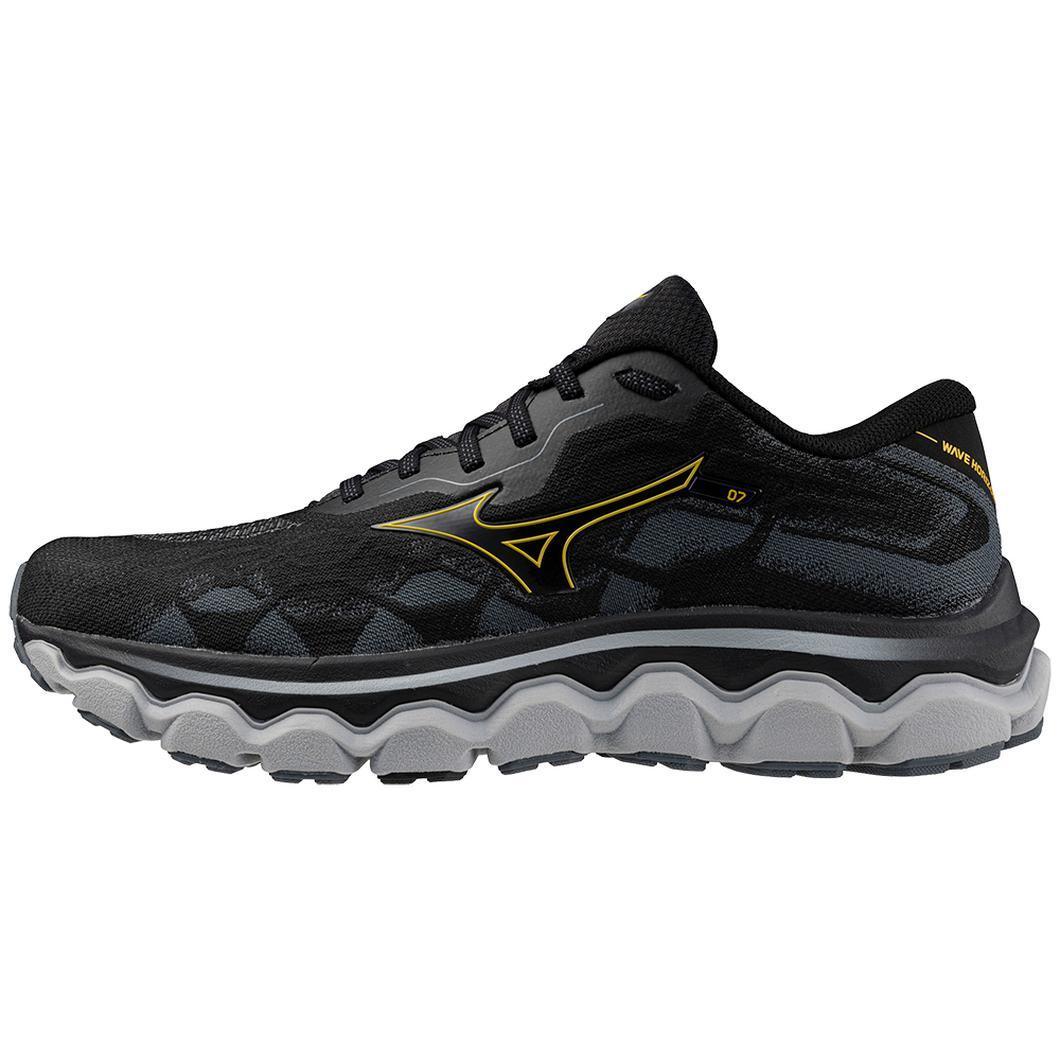 Black and gray athletic running shoe with yellow accents, wave sole design, side view
