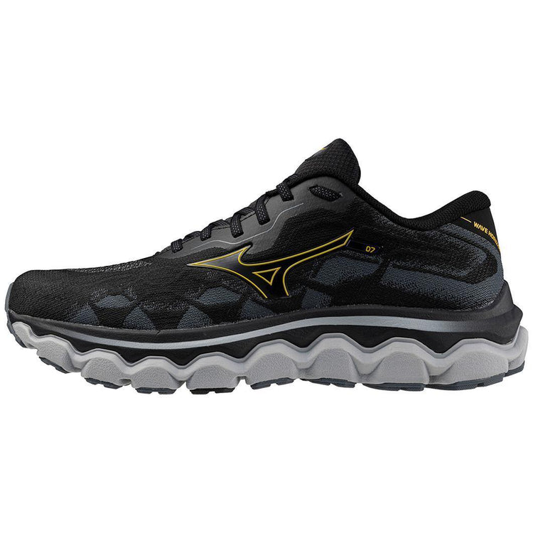 Black and gray athletic running shoe with yellow accents, wave sole design, side view