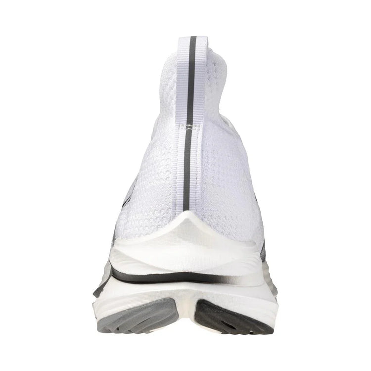 Rear view of a white athletic sneaker with gray accents and a knit upper