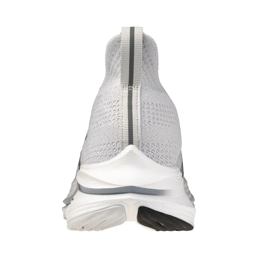 Rear view of a white athletic sneaker with gray details and a textured knit upper