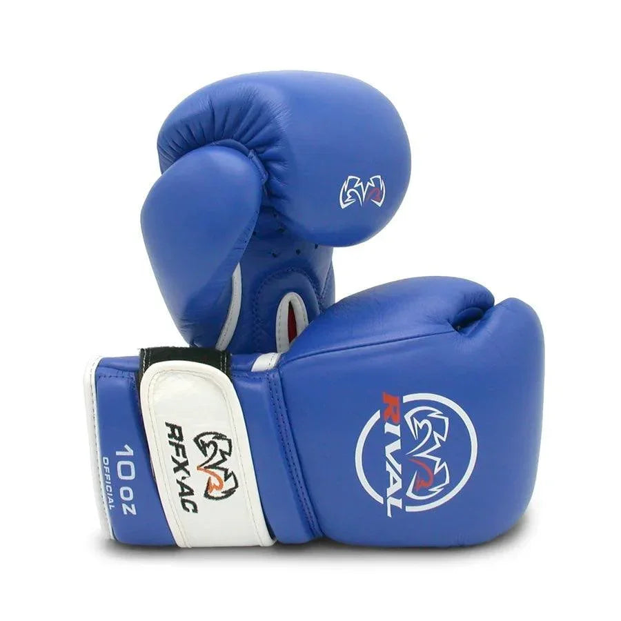 Blue amateur boxing gloves with white wrist strap and Rival logo, 10 oz size, on white background.