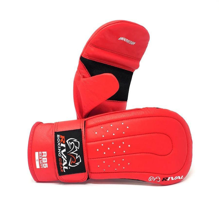 Red boxing training mitts with ergonomic design and Rival logo, used for punch practice