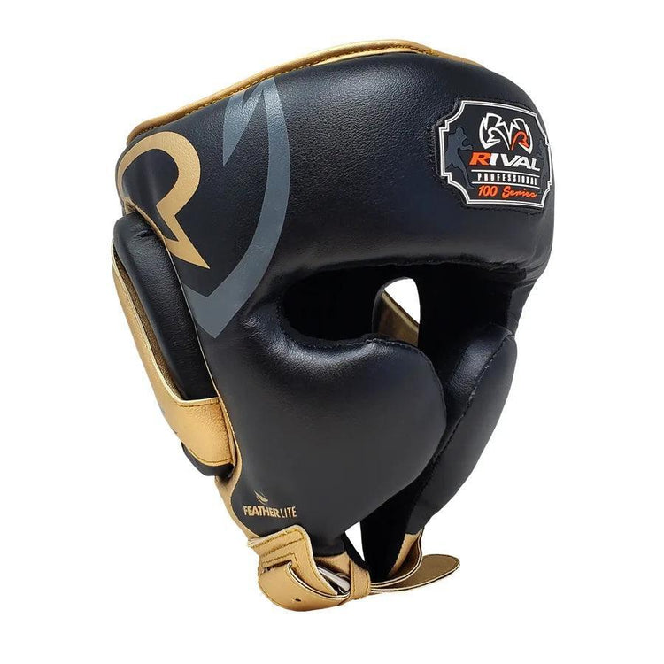 Black and gold boxing headgear with Rival logo, padded protection, and open face design