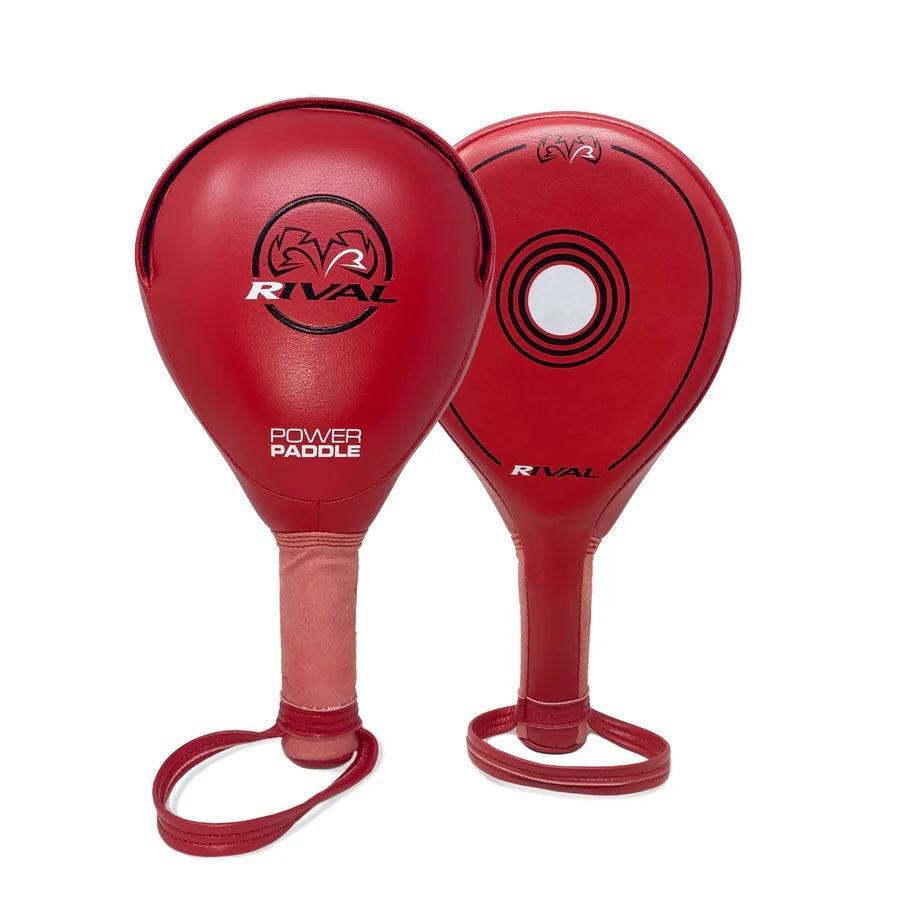 Red Rival boxing power paddles with wrist straps for boxing training and hand-eye coordination.