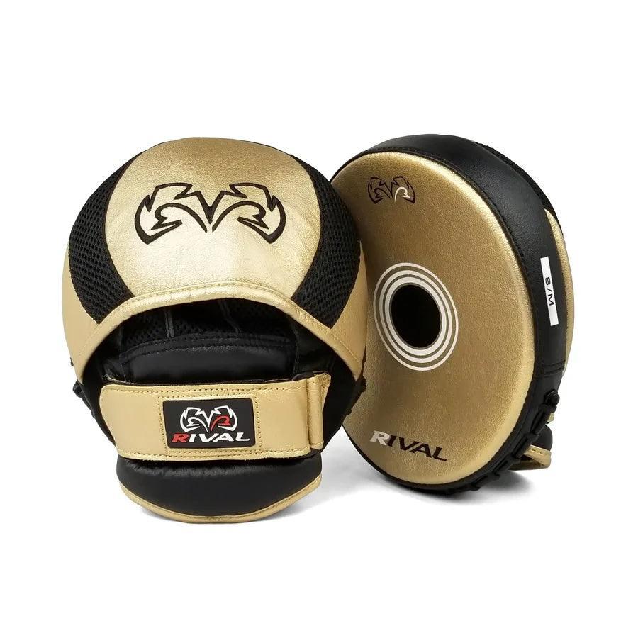 Gold and black Rival boxing focus mitts for training and coaching, logo visible.