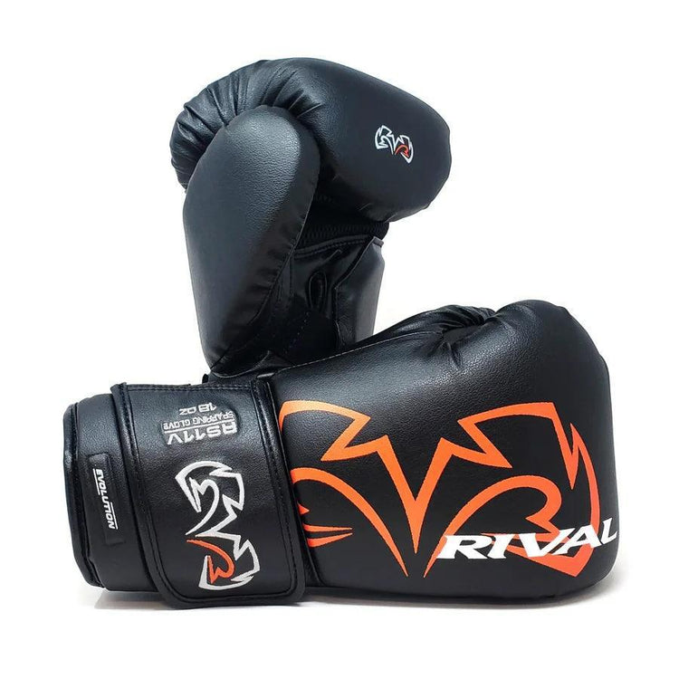 Black Rival boxing gloves with orange and white logo, premium sparring gear.