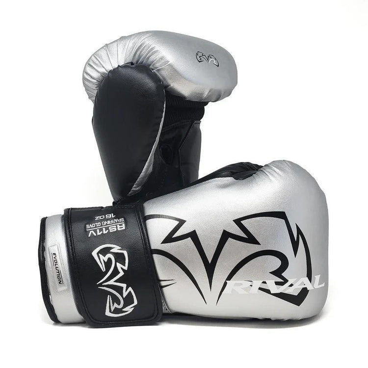 Silver and black boxing gloves with bold black design, suitable for sparring or training.